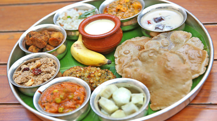 Thalis And Dishes With Wholesome Food Is What You Are In For