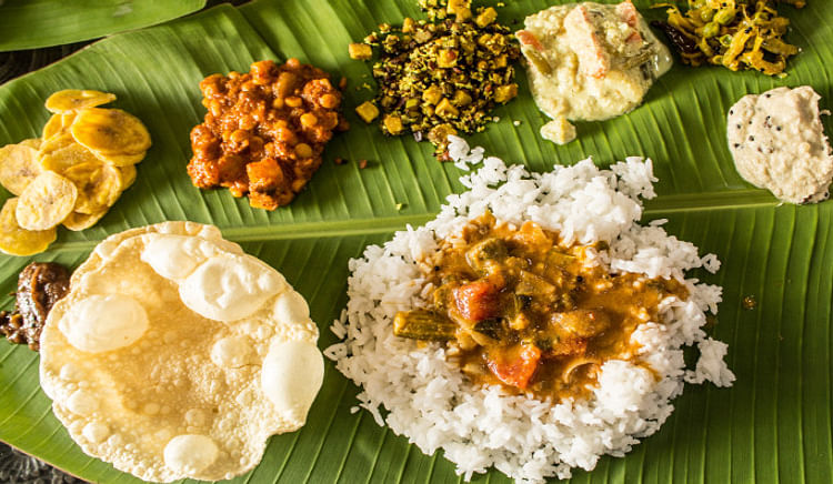 The traditional ela sadya with all the traditional sadya dishes is an experience to be had.