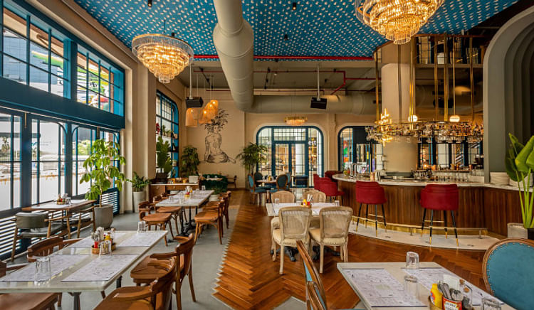 Tune in at this remarkable cocktail den and gourmet kitchen for a good time