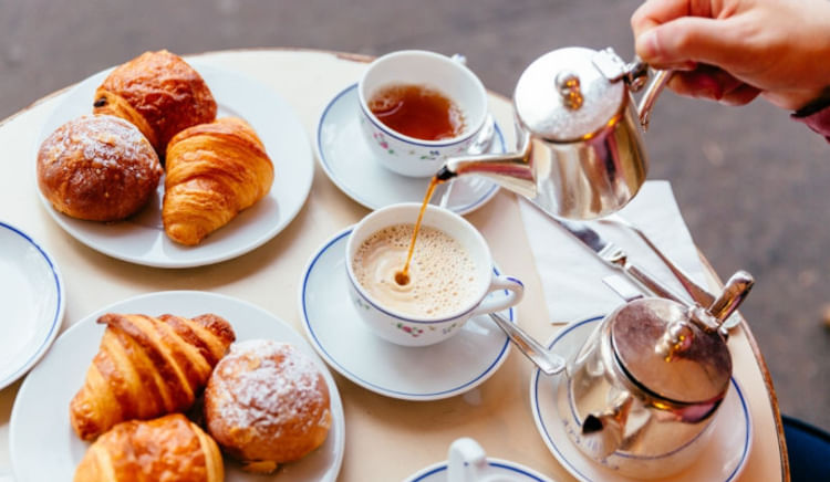 Embrace the warmness during rainy days with a steaming cup of Tea/Coffee