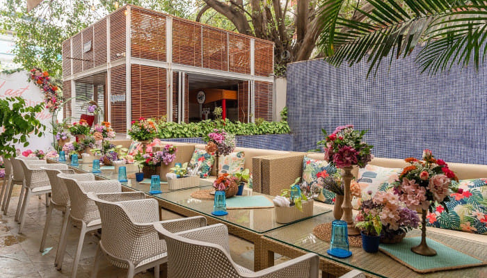 Scrumptious bites and eclectic drinks await at this poolside dining marvel