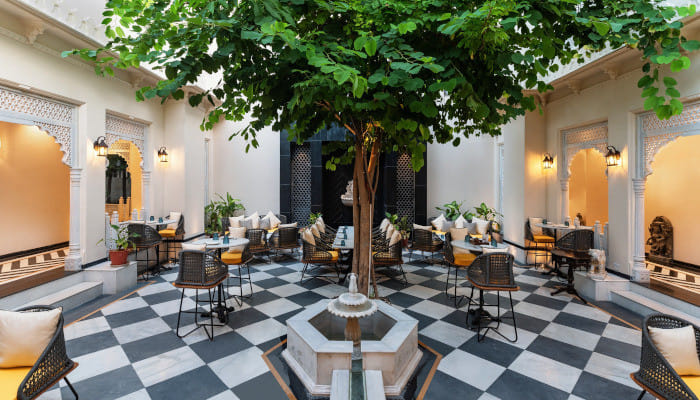 Experience a modern twist on traditional favourites in a stunning courtyard lounge