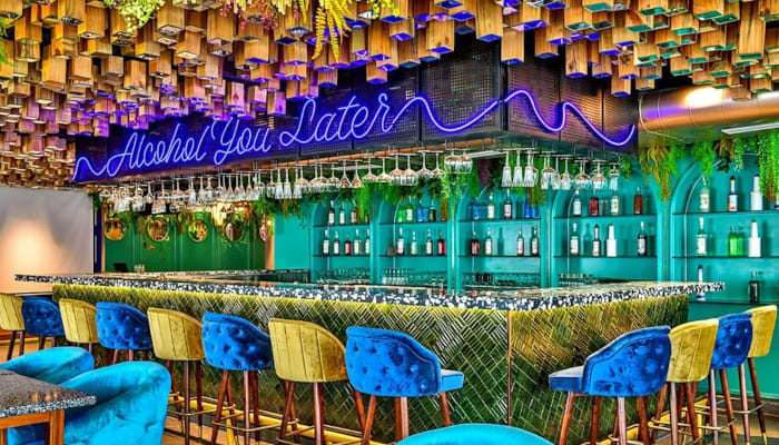 Find your ideal feel-good spot in town, featuring food, cocktails, and great music