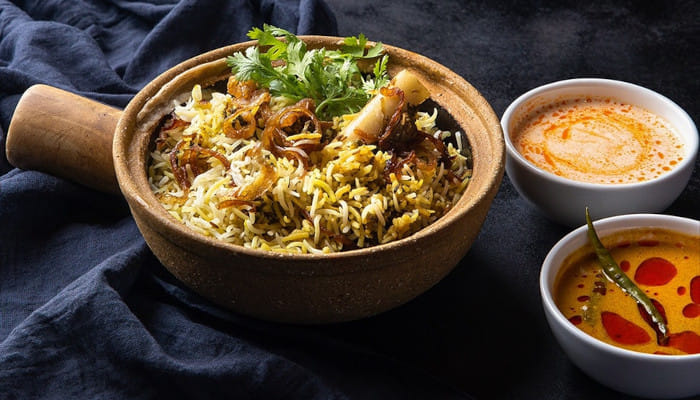 Savor the rich, aromatic biryani at Hyderabad's most iconic restaurants