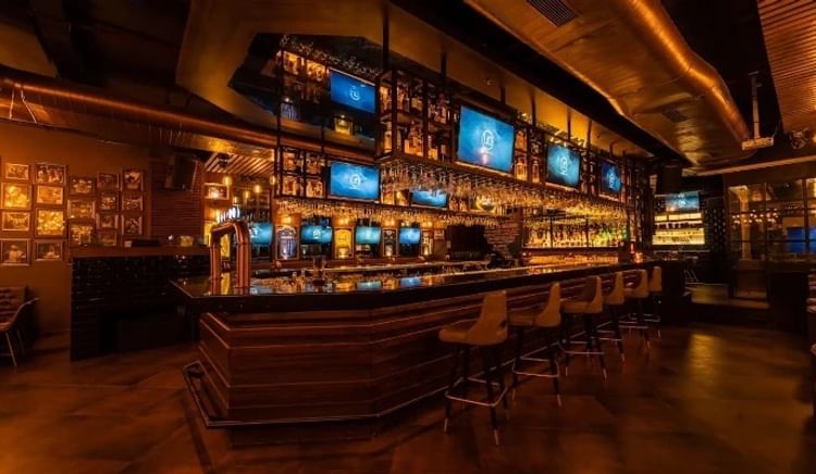 Your ultimate guide to screens, screams, and scrumptious bites this football season