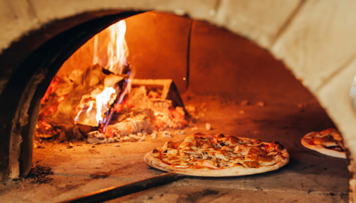 Where smoky crusts meet cheesy perfection