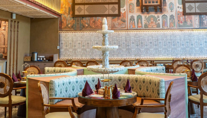 From charcoal-grilled kebabs to slow-cooked curries, here's a closer look at what makes this Tajganj address worth a table